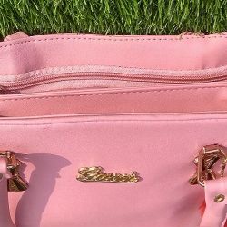 Ladies handbags in pink color for wedding, party, festival, etc. 