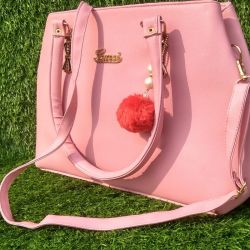 Ladies handbags in pink color for wedding, party, festival, etc. 