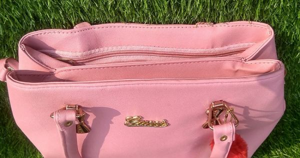 Ladies handbags in pink color for wedding, party, festival, etc. 