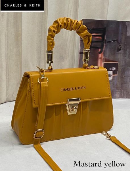 *_ CHARLES & KEITH _*