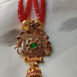 Red pearl long necklace ! With guaranteed pendant .