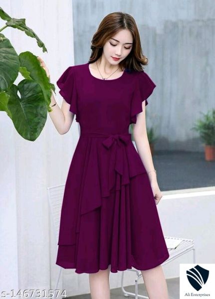 Women Peach Solid Knee Length, Fit And Flare & A-line Georgette Dress
