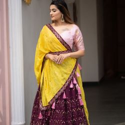 Lehenga choli The carnation wine with the intricate sequins work gives this lehenga a neat finish.