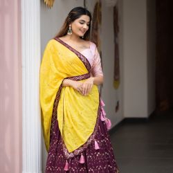 Lehenga choli The carnation wine with the intricate sequins work gives this lehenga a neat finish.
