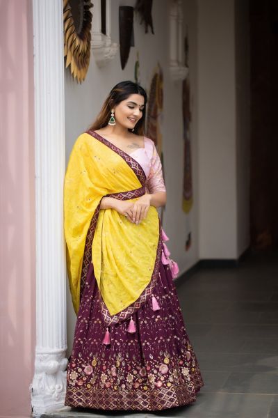 Lehenga choli The carnation wine with the intricate sequins work gives this lehenga a neat finish.